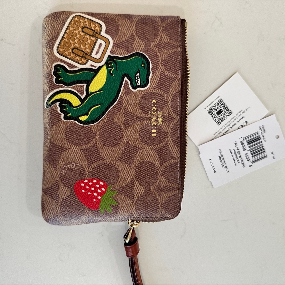 Coach Brown Wristlet with Dinosaur and Strawberry Patches